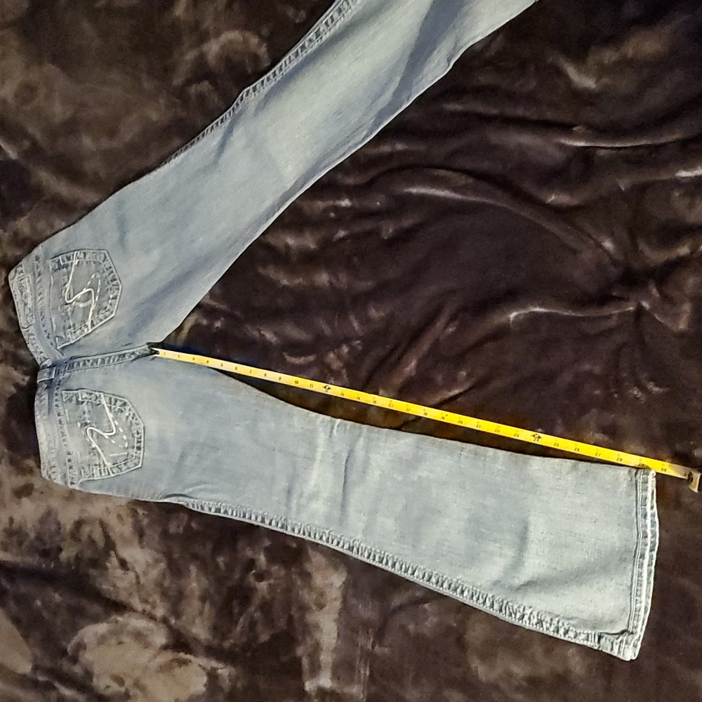 Light wash silver jeans